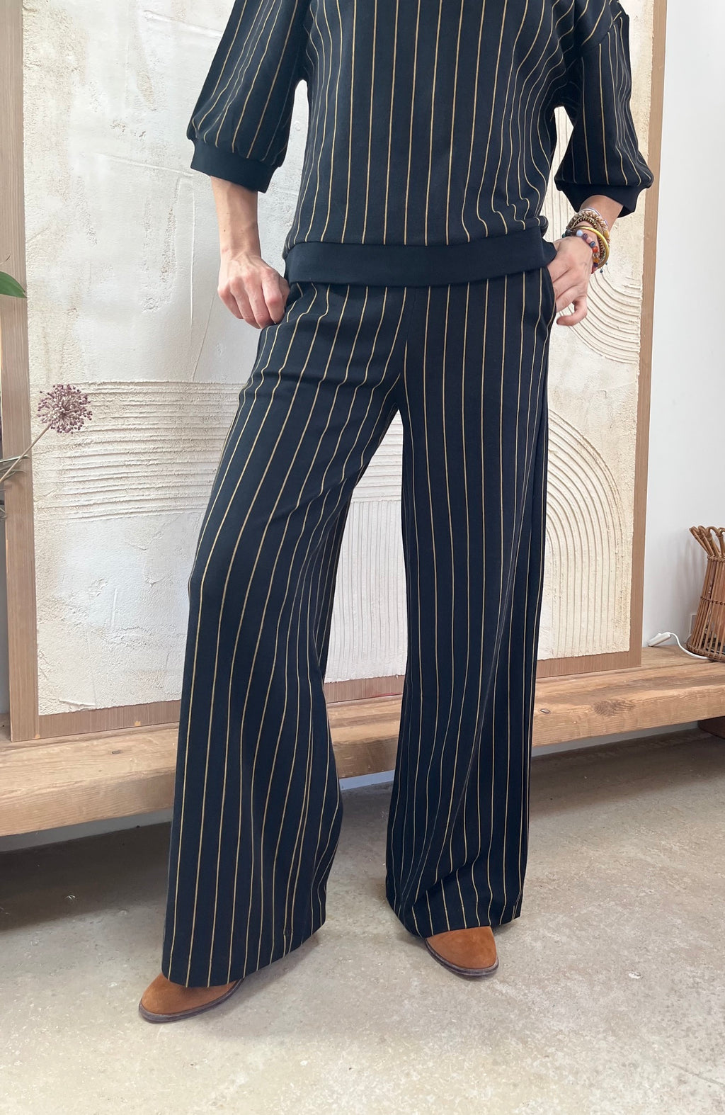 Pantalon noir rayé